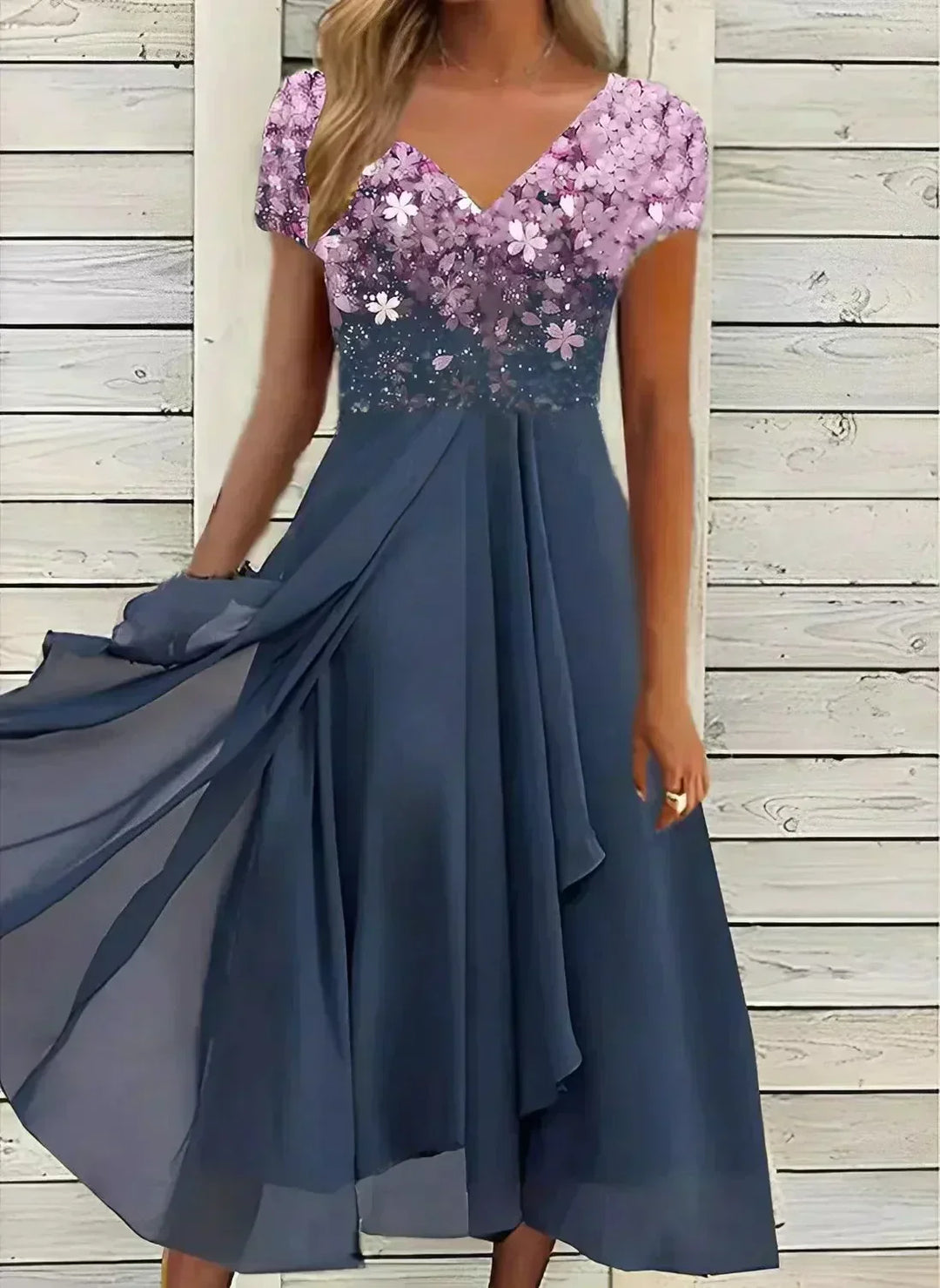 "Women's chiffon evening maxi dress with floral bodice, featuring flowing fabric and shimmering floral design for elegant eve