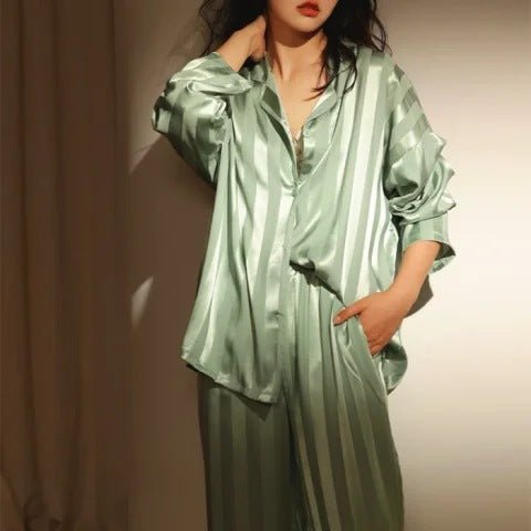 Women's classic striped pajama set with buttoned top and elastic waist pants in breathable fabric for comfort and style.
