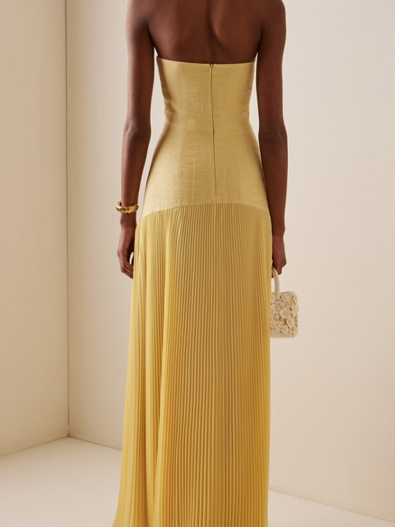 "Women's strapless pleated maxi dress in green and yellow, front view; elegant evening wear with a pleated skirt."
