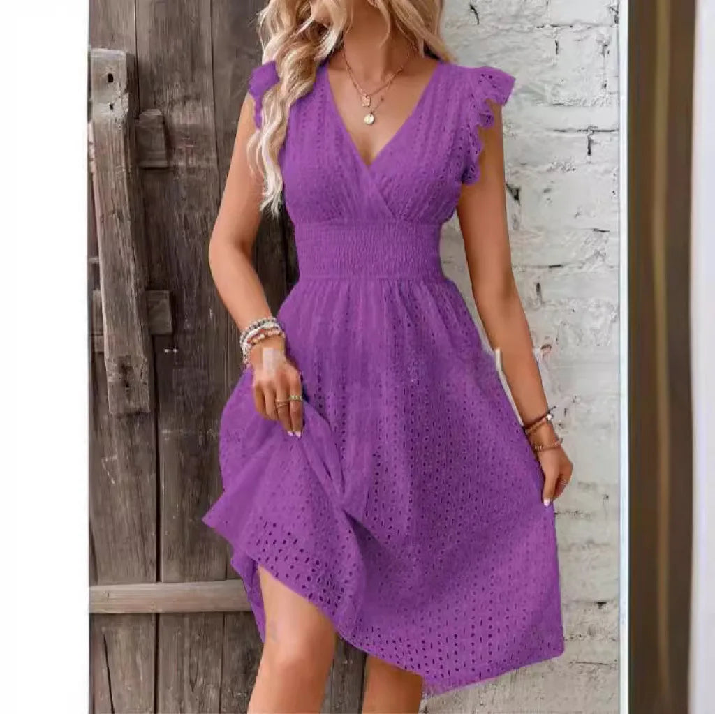 "Women's V-Neck eyelet summer dress with smocked waist, ruffled sleeves, and knee-length A-line in light fabric."