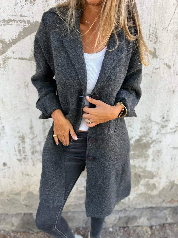 Women's wool-blend button-down jacket, elegant design, classic lapel collar, cuffed sleeves, flattering fit, cozy fabric.